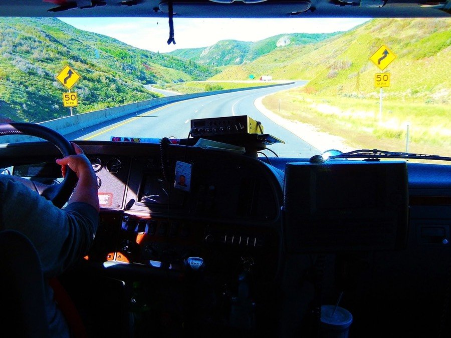 View from the cab of a truck on the highway